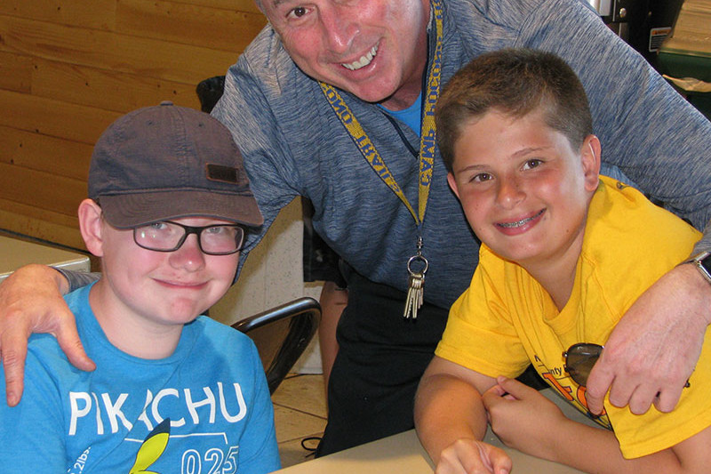 boys with tony at camp